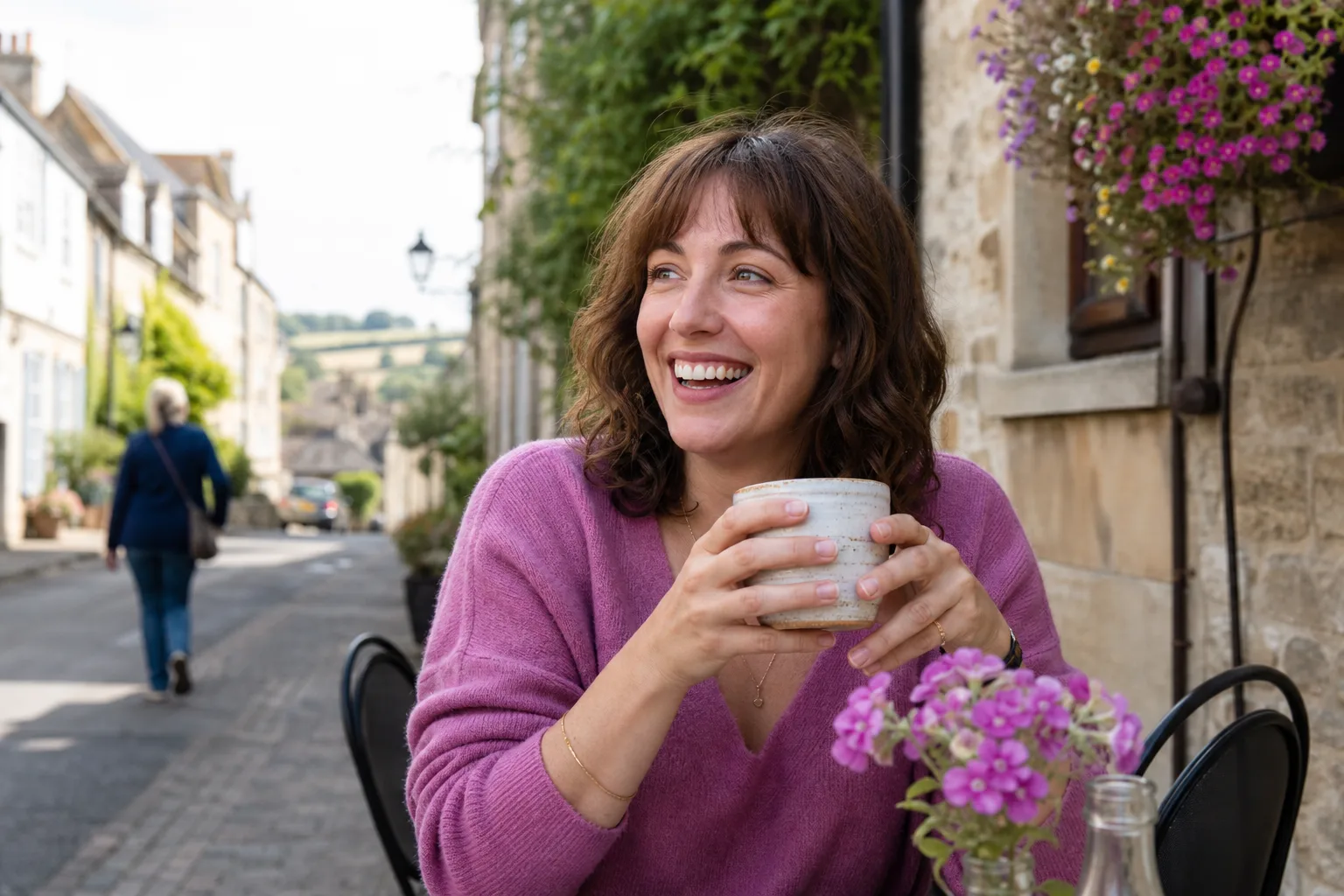 Woman reviewing photographs for her dating profile at a Wiltshire café