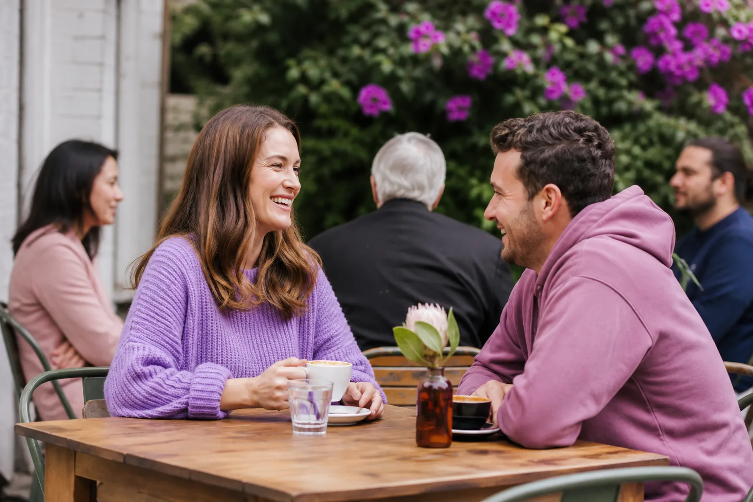 Two people talking over coffee in Salisbury city centre